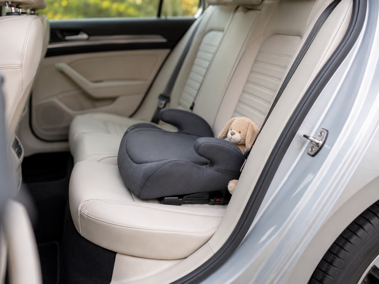 Free child booster seat fitted in saloon car for Heathrow Airport family taxi booking